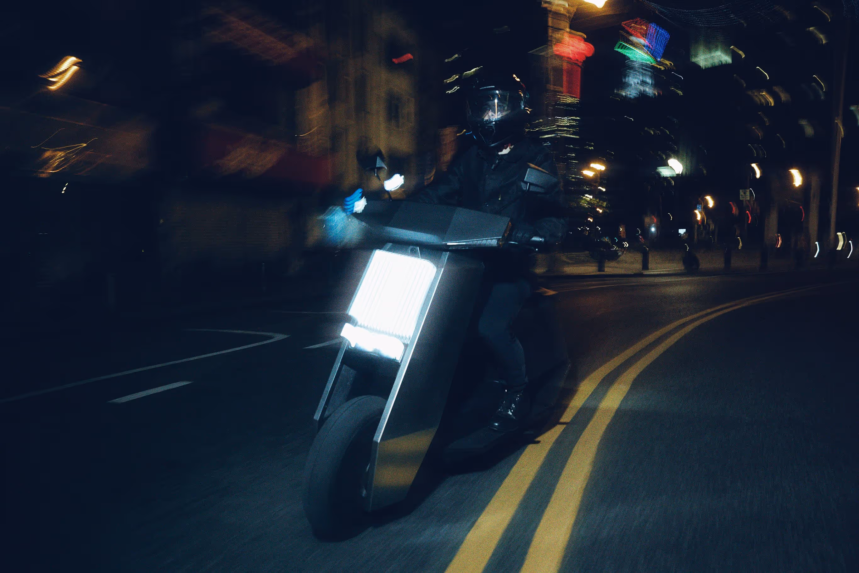 Infinite Machine Olto campaign photo riding in traffic